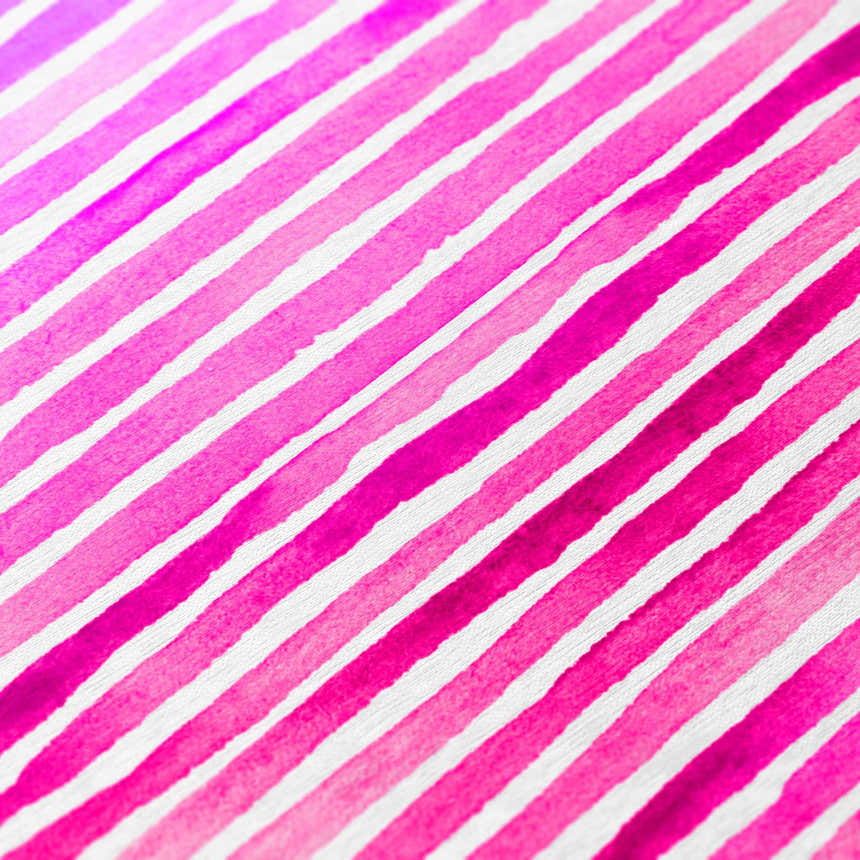 Close-up of Dalyn Seabreeze Blush rug showing pink, magenta, and red stripes on a textured white background.