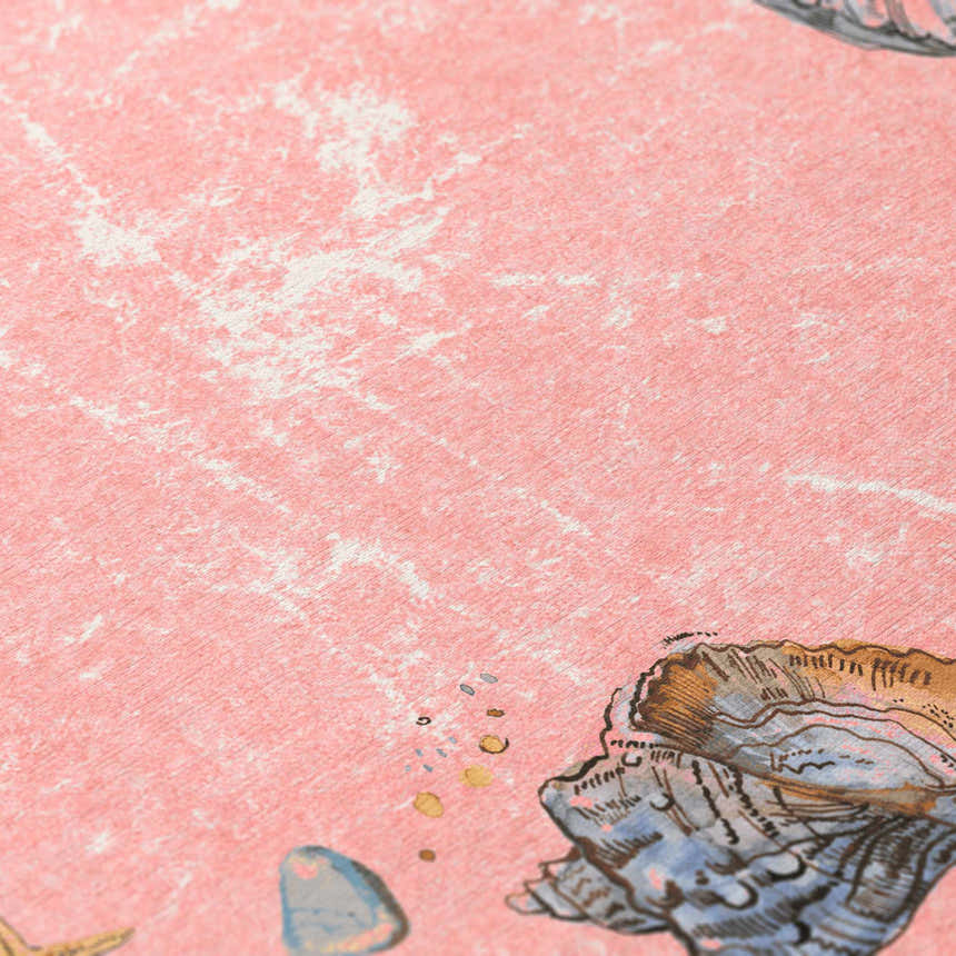 Close-up of the Dalyn Seabreeze Salmon Washable Area Rug featuring a coastal seashell and starfish pattern.