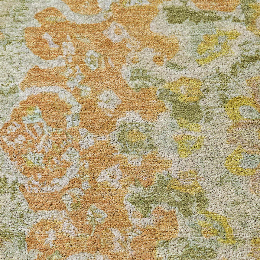 Close-up of the Dalyn Luxury Indoor/Outdoor Tabrook TB11 Aloe Area Rug, showing its aloe, beige, and caramel floral pattern.