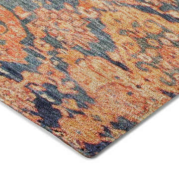Close-up of the Dalyn Luxury Tabrook TB3 Terracotta Area Rug showing beige, burnt orange, and navy abstract pattern.