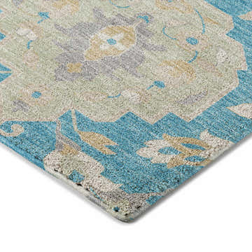 Close up of the blue Dalyn Luxury Tabrook TB4 Area Rug, with beige, taupe, and teal floral pattern.