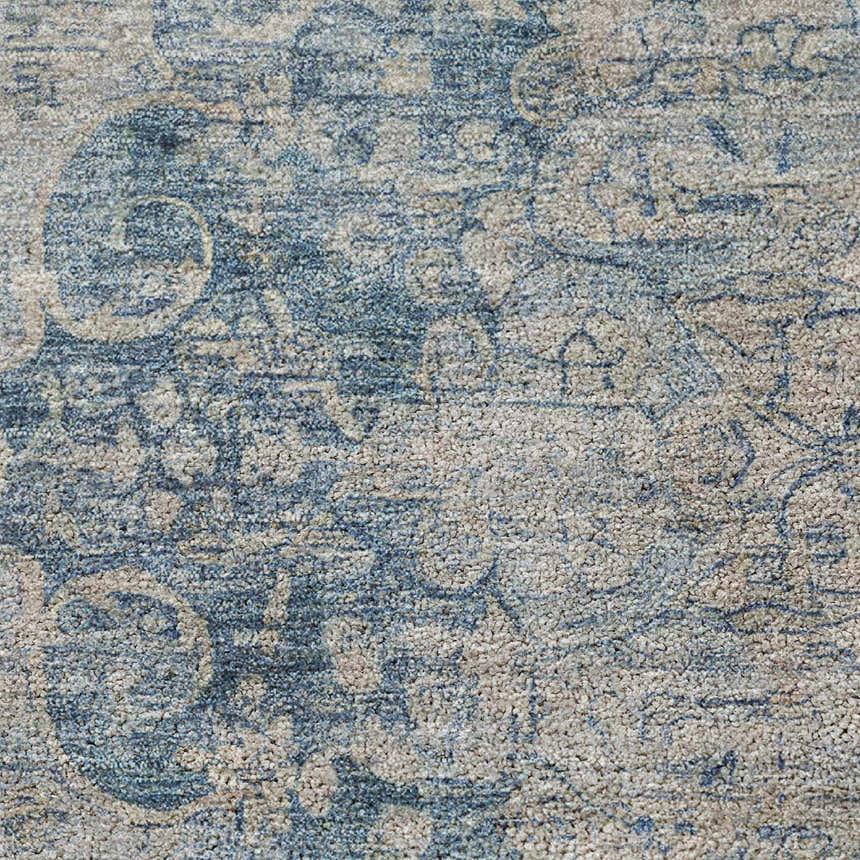 Close-up of the Dalyn Luxury Indoor/Outdoor Tabrook TB5 Blue Area Rug. Beige and blue traditional pattern.