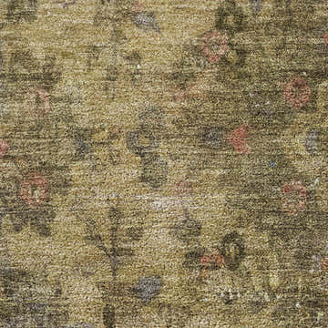 Close-up of the Dalyn Luxury Indoor/Outdoor Tabrook TB8 Tan Area Rug. Features blush pink, olive, and silver gray accents.