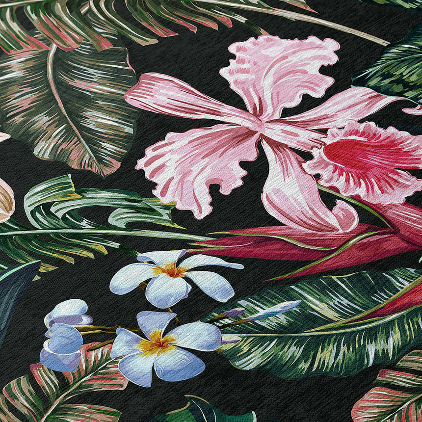 Close-up of Dalyn Tropics TC6 Black Washable Area Rug featuring pink orchids, white plumeria, and green tropical leaves.