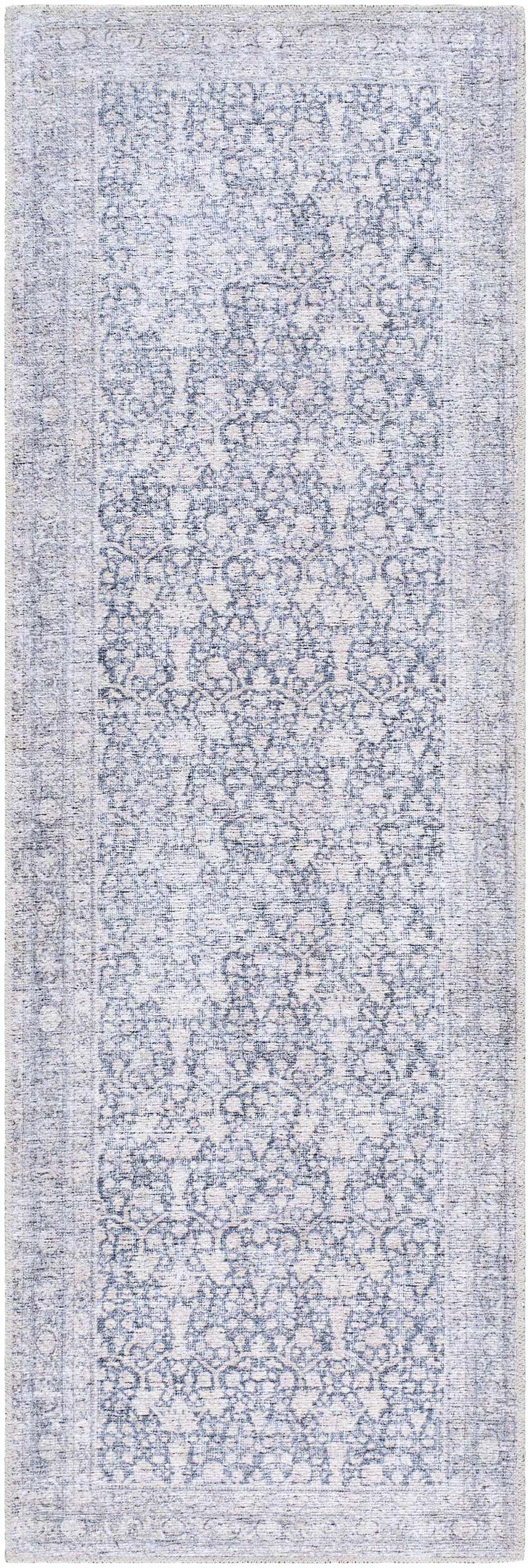 Close-up of Lorelai Machine Woven Washable Area Rug. Beige and blue traditional pattern with a subtle farmhouse style. Design-Runner-2676