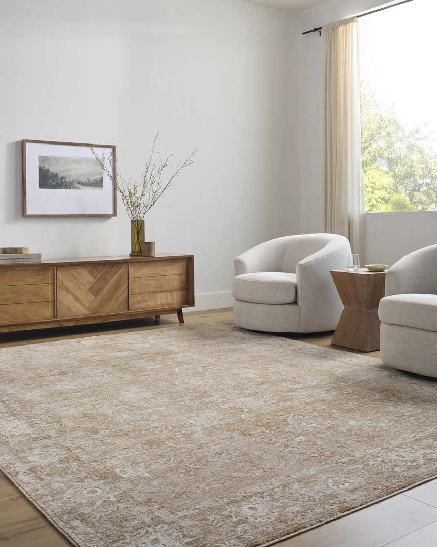 Living room scene with a tan Tylie Area Rug, cream chairs, and wood console table. Roomscene-Rectangle