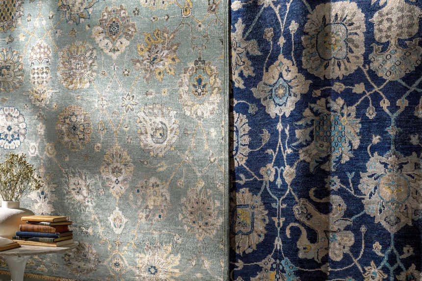 Close-up of the Toquerville Premium Rug in aqua and charcoal, showing the traditional floral pattern and viscose texture. Styleshot