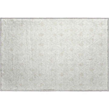 Close-up of the Dalyn Luxury Indoor/Outdoor The Reserve TR10 Ivory Washable Area Rug with a subtle geometric pattern.