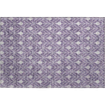 Close-up of the Dalyn Luxury The Reserve TR10 Plum Washable Area Rug. Geometric leaf pattern in plum and chestnut.