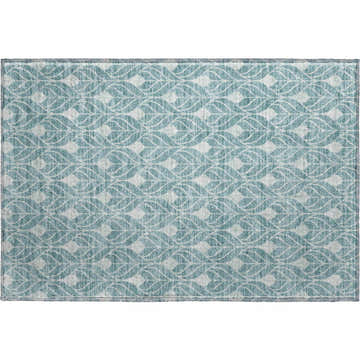 Close-up of Dalyn Luxury Indoor/Outdoor The Reserve TR10 Teal Washable Area Rug with a geometric leaf pattern.