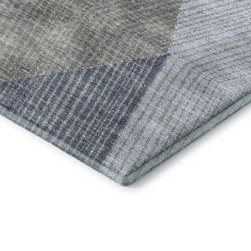 Close-up of Dalyn Luxury The Reserve TR11 Denim Washable Area Rug. Geometric design in beige, denim, navy, and sky blue.