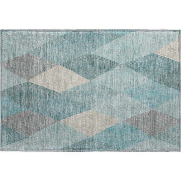 Close up of the Dalyn Luxury The Reserve TR11 Turquoise Washable Area Rug with a geometric pattern in aloe, aqua, and gray.