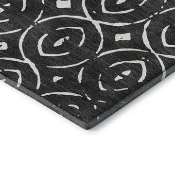 Close-up of the Dalyn Luxury Indoor/Outdoor The Reserve TR12 Black Washable Area Rug featuring a black and off-white geometric pattern.
