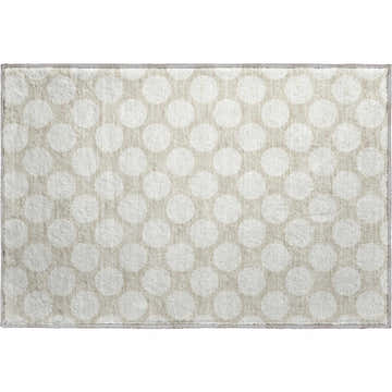 Close-up of Dalyn Luxury The Reserve TR13 Beige Washable Area Rug with a geometric white dot pattern.