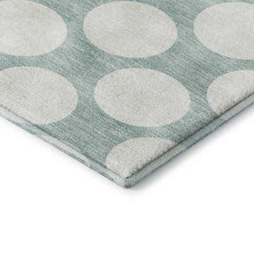Close-up of Dalyn Luxury Indoor/Outdoor The Reserve TR13 Seafoam Washable Area Rug with a geometric, dotted pattern.