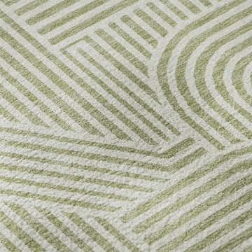 Close-up of Dalyn Luxury The Reserve TR14 Aloe Washable Area Rug. Geometric pattern in aloe green on a textured white background.