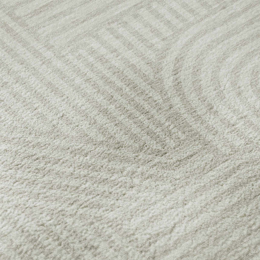 Close-up of the beige Dalyn Luxury Indoor/Outdoor The Reserve TR14 rug showing geometric pattern and soft texture.