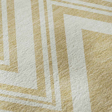 Close-up of the Dalyn Luxury The Reserve TR17 Honey Washable Area Rug, featuring a geometric pattern in yellow and white.