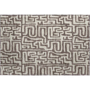 Close-up of Dalyn Luxury The Reserve TR1 Chocolate Washable Area Rug. Geometric pattern in brown, chestnut, and black.