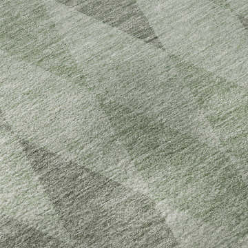 Close-up of Dalyn Luxury The Reserve TR2 Fern Washable Area Rug. Geometric pattern in aloe, green, muted sage, and charcoal.