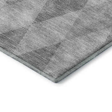 Close-up of the Dalyn Luxury The Reserve TR2 Gray Washable Area Rug, featuring a geometric pattern in gray, silver gray, and taupe.