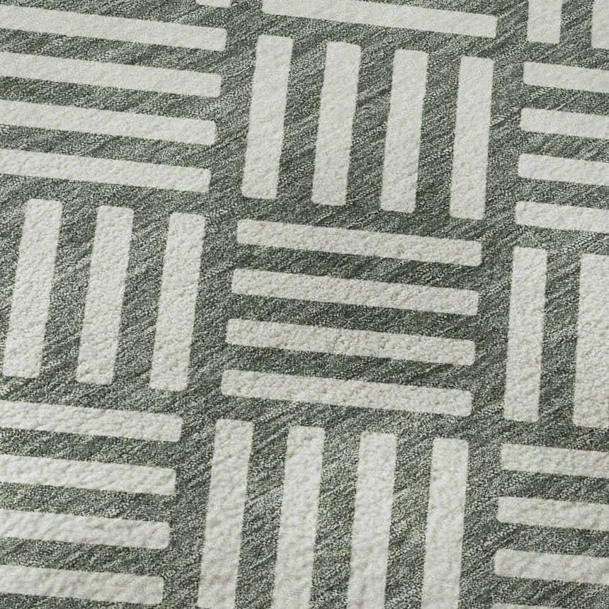 Close-up of Dalyn Luxury The Reserve TR3 Basil Washable Area Rug showing geometric pattern and basil and chestnut colors.