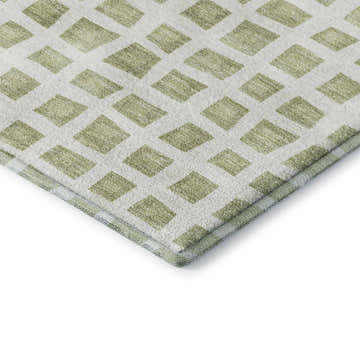 Close-up of Dalyn Luxury Indoor/Outdoor The Reserve TR4 Aloe Washable Area Rug. Green geometric diamond pattern.