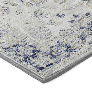 Close-up of the Dalyn Tuscany TU1 Silver Area Rug showing its beige, gold, and blue traditional floral pattern.