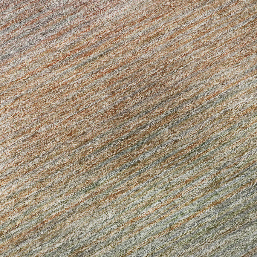 Close-up of Dalyn Luxury Trevi TV11 Coral Washable Area Rug. Beige, coral, and brown diagonal pattern.