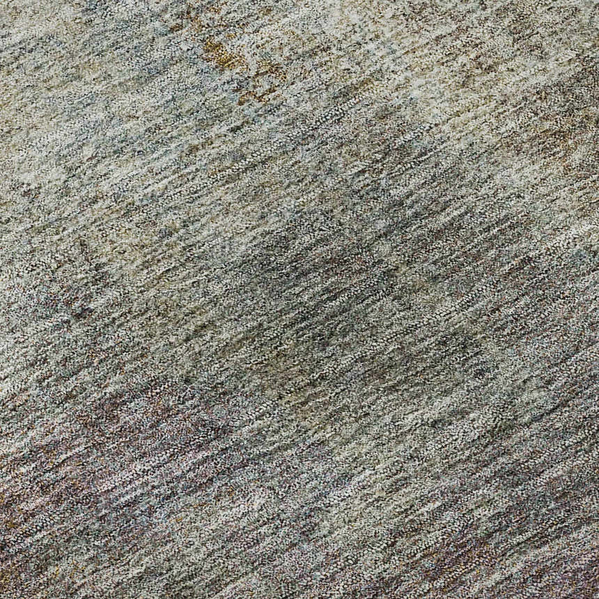 Close-up of the Dalyn Luxury Trevi TV12 Mocha Washable Area Rug. Beige, brown, and purple tones.