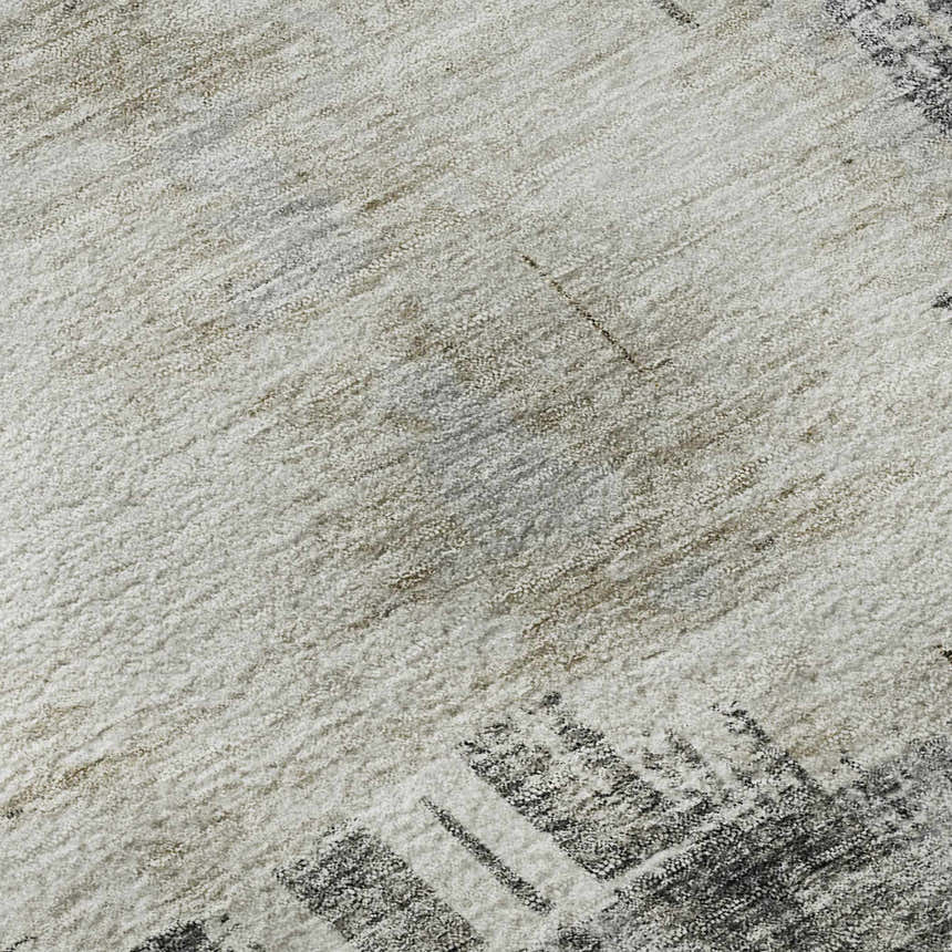 Close-up of the Trevi TV18 Gray Washable Area Rug, showing its gray, ivory, and taupe colors and textured pattern.