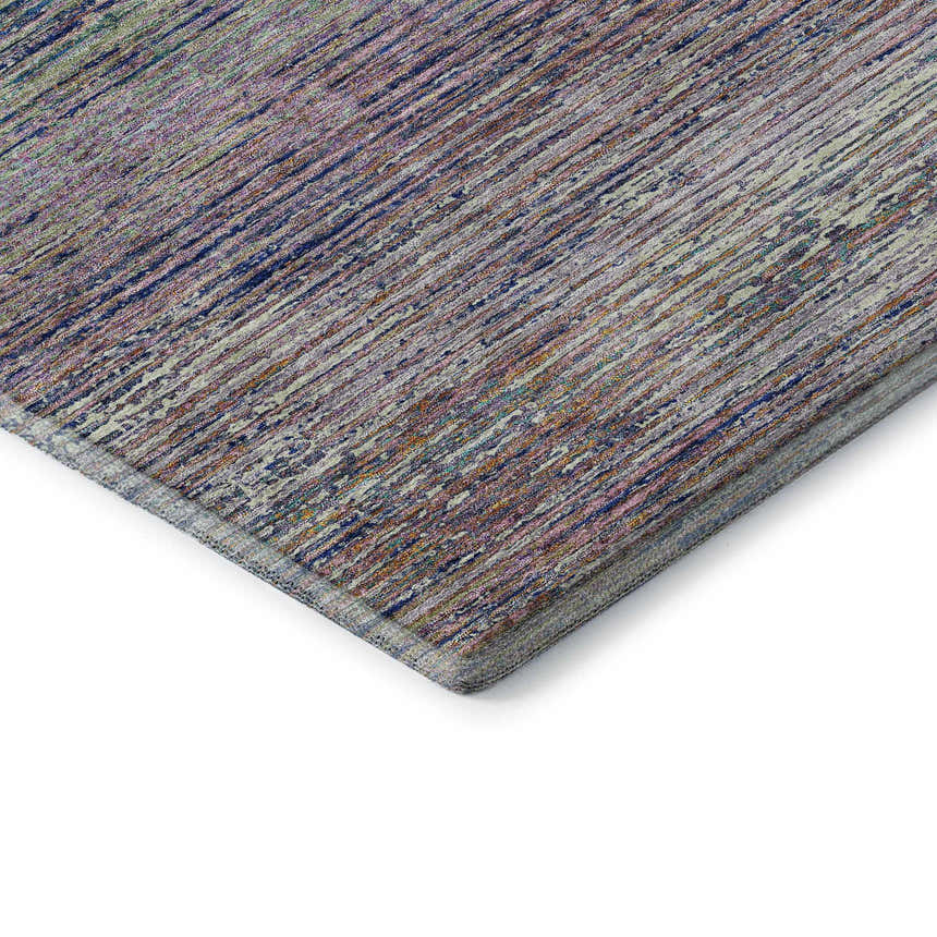 Close-up of Dalyn Luxury Trevi TV1 Blush Washable Area Rug. Features blush, blue, green, and purple linear design.
