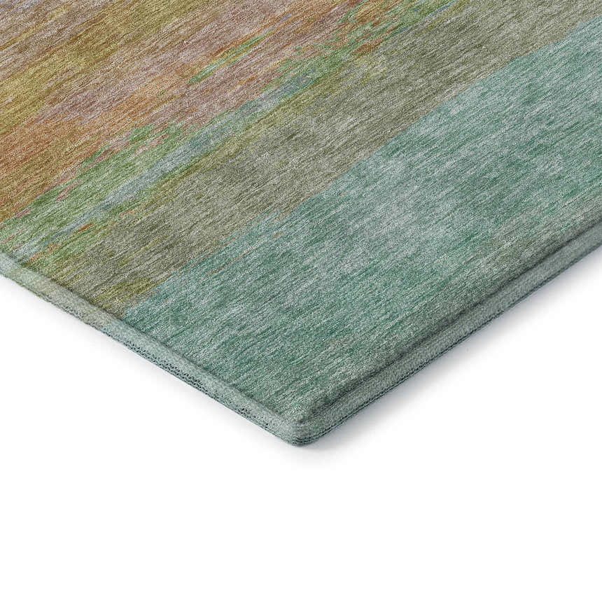 Close-up of the Dalyn Luxury Trevi TV2 Lavender Washable Area Rug, featuring burnt, gold, light blue, purple, teal, and yellow hues.