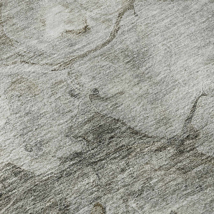 Close-up of the Dalyn Luxury Indoor/Outdoor Trevi TV7 Taupe Washable Area Rug with beige, brown, and gray abstract pattern.