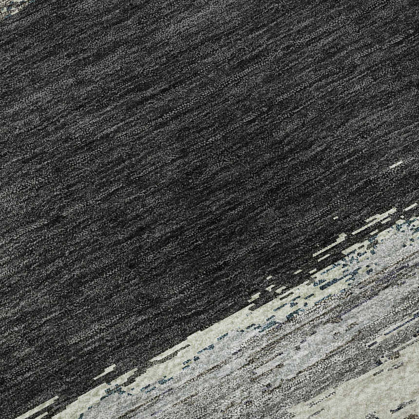 Close-up of Dalyn Luxury Trevi TV8 Black Washable Area Rug featuring a textured black and beige pattern.