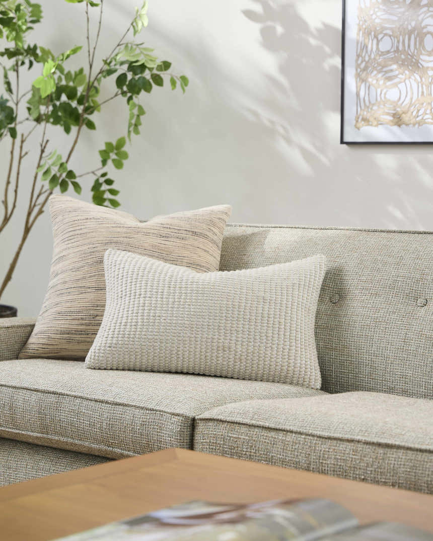 Trory Beige Throw Pillow