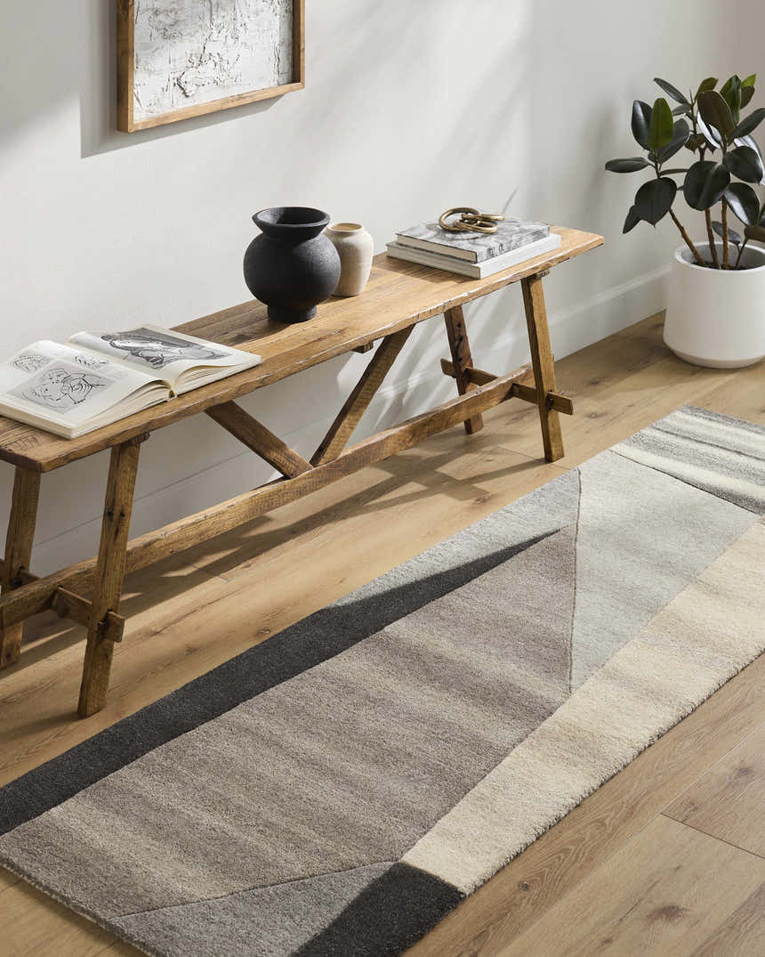 Hallway with wood bench, decor, and Toril Modern Wool Rug in ash, onyx, sage, and silver gray. Roomscene-Rectangle