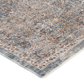 Close-up of the Dalyn Vienna VI7 Denim Area Rug featuring beige, brown, and denim traditional pattern.