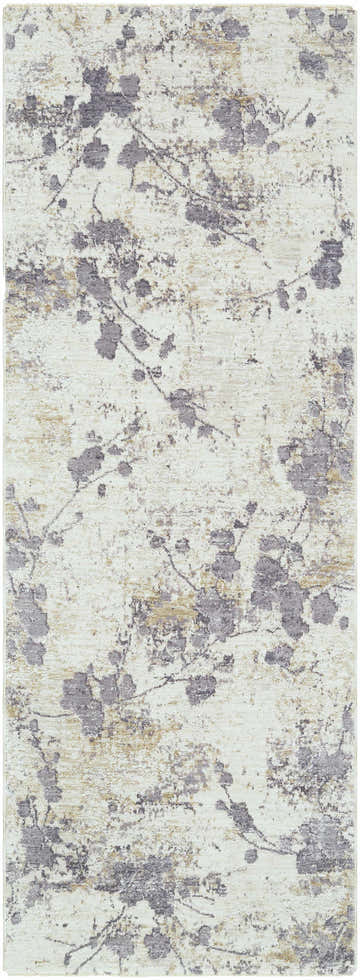Close-up of the Aquila Cream Area Rug, featuring a charcoal floral pattern on a cream and tan background. Southwestern style. Design-Runner-2773