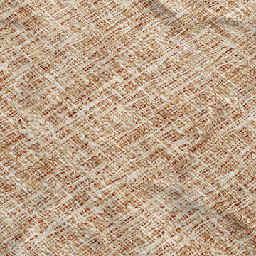Close-up of the caramel Dalyn Luxury Voyage VY1 Copper Washable Area Rug, showing its woven texture and farmhouse style.