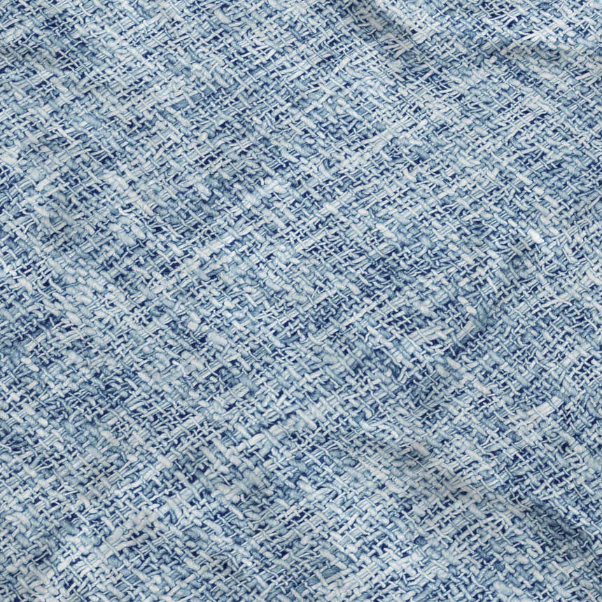 Close-up of the Dalyn Luxury Voyage VY1 Denim Washable Area Rug, showing its woven texture and denim blue color.