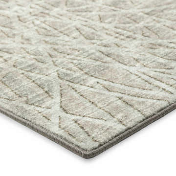 Close up of the Dalyn Winslow WL2 Taupe Area Rug showing beige, ivory, and light brown geometric pattern.