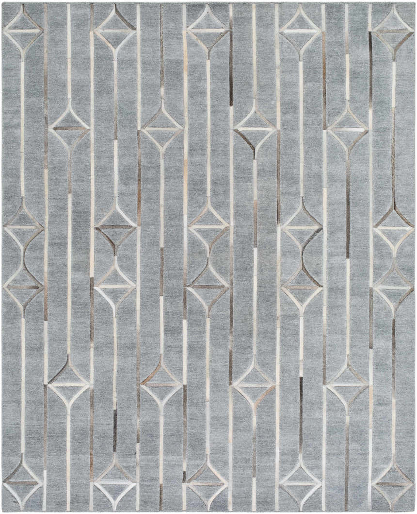 Close-up of the Willingham Area Rug. Charcoal gray rug with light beige, light gray, and taupe geometric diamond pattern. Design-Rectangle-810