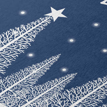 Close-up of Dalyn Wonderland WN12 Navy Washable Area Rug. Features white trees, stars, and a navy background. Holiday style.