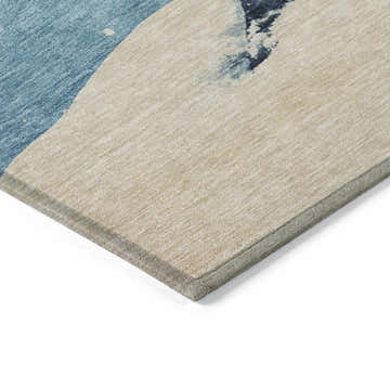 Close-up of the corner of a Dalyn Wonderland WN15 Blue Washable Area Rug, showing the blue and beige pattern and texture.