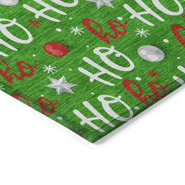 Close-up of the Dalyn Wonderland WN18 Green Washable Area Rug. Holiday style with red, off-white, and silver gray