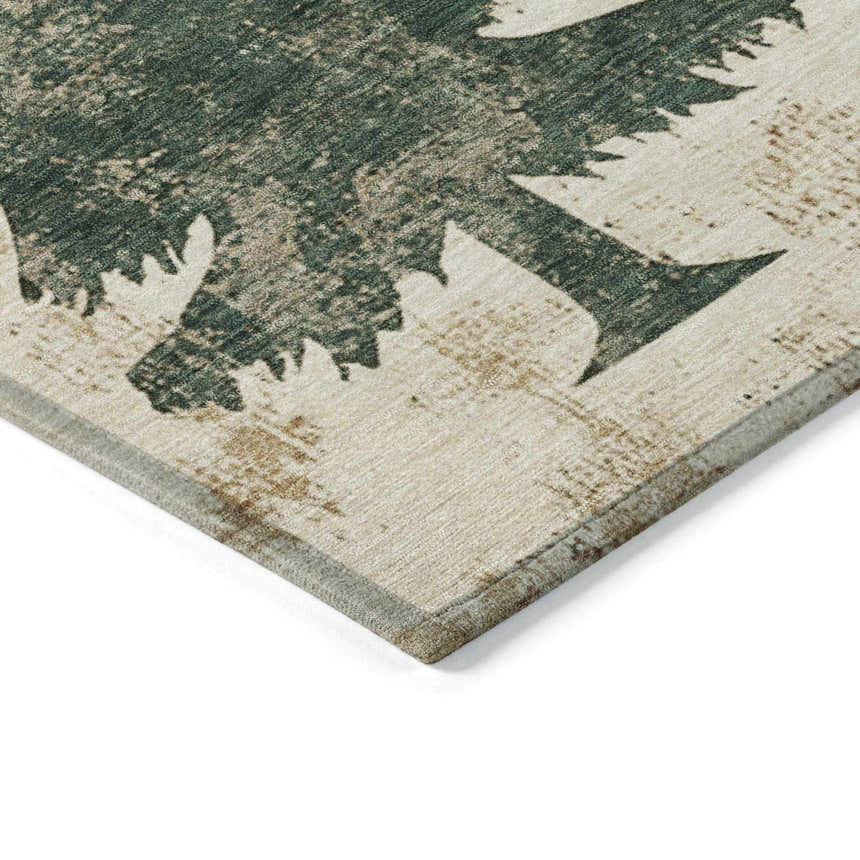 Close up of the Dalyn Wonderland WN19 Ivory Washable Area Rug, featuring a green tree design on an ivory background.