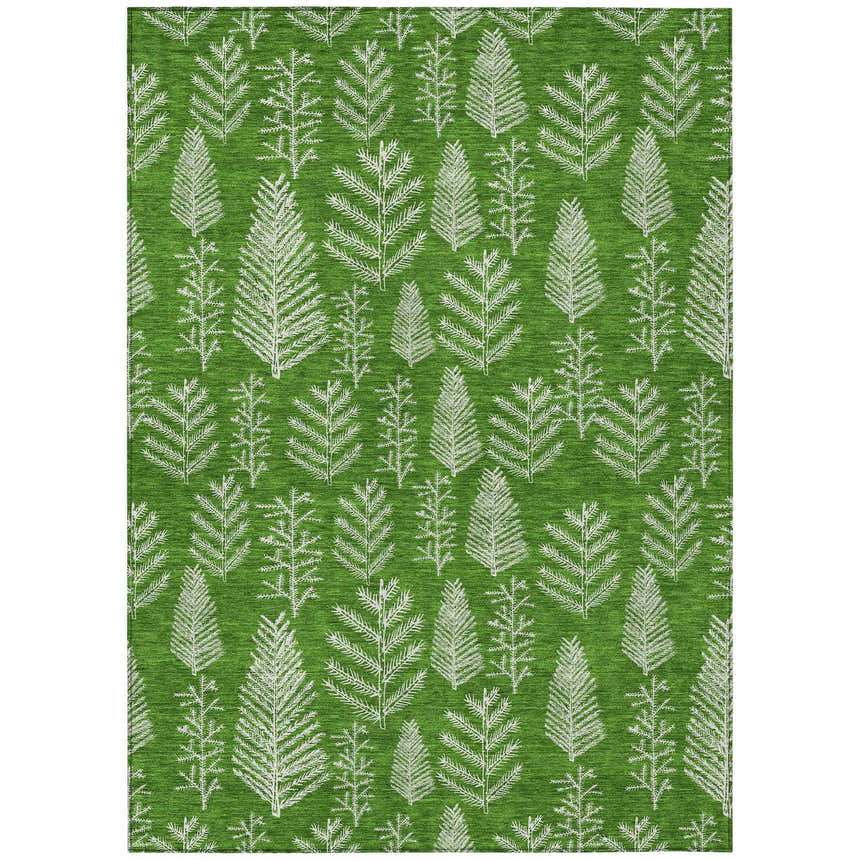 Close-up of the Dalyn Wonderland WN21 Green Washable Area Rug featuring a white Christmas tree pattern on a textured green background.