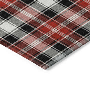 Close-up of Dalyn Wonderland WN25 Black Washable Area Rug with a black, red, and off-white plaid design.
