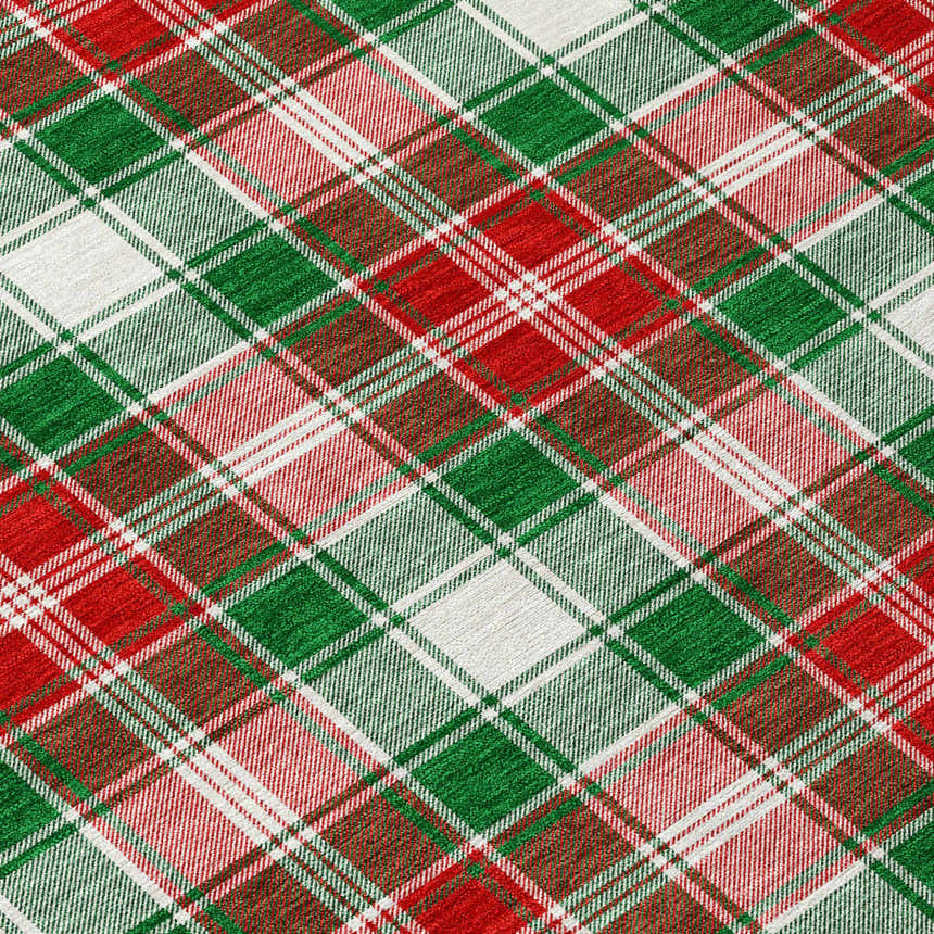Close-up of Dalyn Wonderland WN25 Emerald Washable Area Rug. Red, green, and off-white plaid pattern. Holiday style.